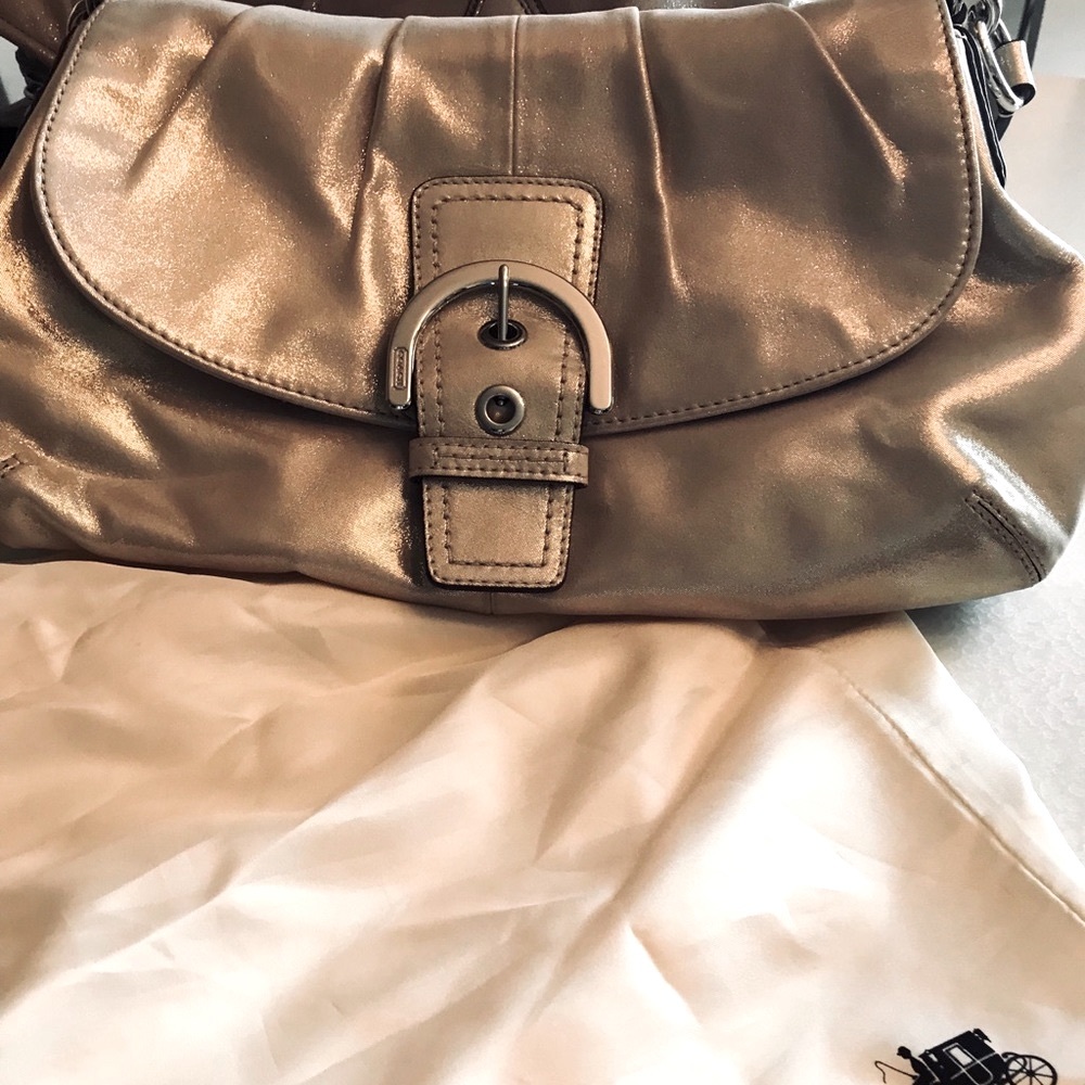 Coach gold metallic clutch purse  single handle Never used / brand-new